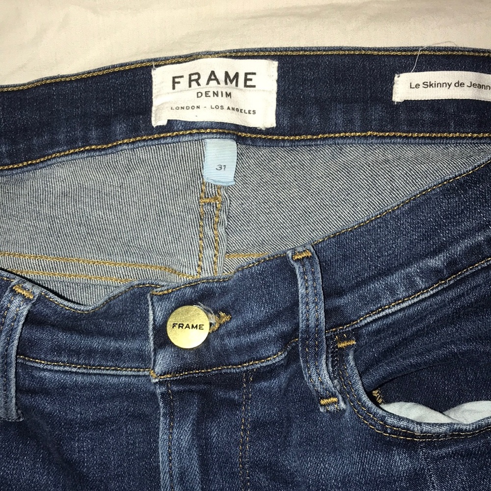 Frame skinny jeans with slits at the bottom